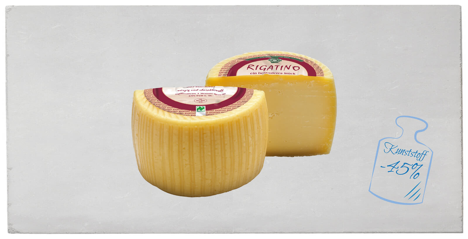 Auf dem Bild sind zwei Stücke Käse mit der Bezeichnung